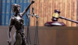 Legal Law concept - Open law book with a wooden judges gavel on table in a courtroom or law enforcement office. Copy space for text Legal Law concept - Open law book with a wooden judges gavel on table in a courtroom or law enforcement office. Copy space for text